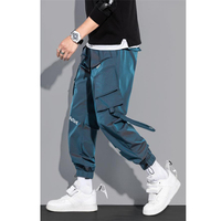 Męskie spodnie Cargo moda hip-hopowe spodnie z kieszenią modna odzież uliczna jednolite spodnie dresowe Pantalones Casuales Para Hombre 4